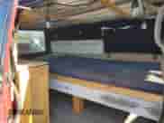 1998 Chevrolet Astro с VIN 1GNEL19WXWB138353, выставлен на аукционе Copart как лот 80909094 с пробегом Не указан миль и Списание • Salvage title. История ставок и продаж доступна на DreamBid. Изображение 11.