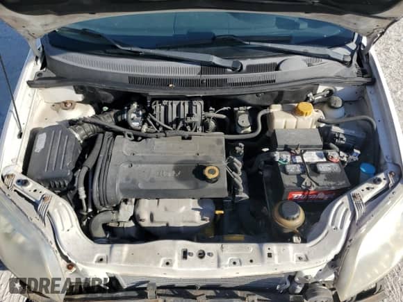 2008 Chevrolet Aveo LS z VIN KL1TD56628B259977, wystawiony jako Copart lot #76049154 z przebiegiem 113 671 mil mil oraz Czysty tytuł • Clean title. Historia ofert i sprzedaży dostępna na DreamBid. Obrazek 11.