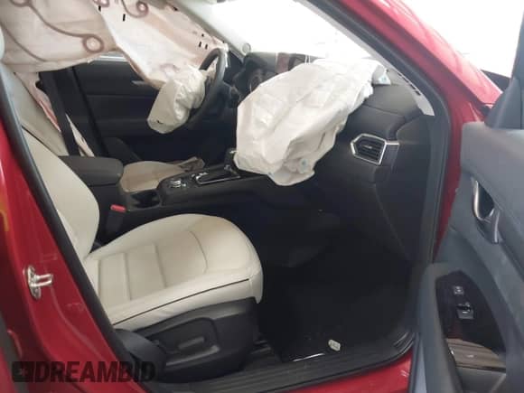 2024 Mazda CX-5 S Preferred z VIN JM3KFBCM8R0385569, wystawiony jako IAAI lot #42883633 z przebiegiem 9 613 mil mil oraz . Historia ofert i sprzedaży dostępna na DreamBid. Obrazek 5.