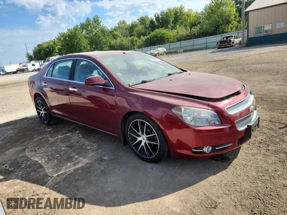 2010 Chevrolet Malibu LTZ with VIN 1G1ZE5EB1AF263220, listed as a Copart auction lot 70822345 with 66,416 mi miles and Salvage title. Bid and sale history available at DreamBid. Image 4.