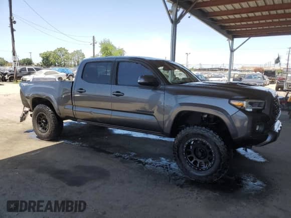 2020 Toyota Tacoma SR5 с VIN 3TMBZ5DN4LM024014, выставлен на аукционе Copart как лот 58260065 с пробегом 145 836 миль миль и Списание • Salvage title. История ставок и продаж доступна на DreamBid. Изображение 4.