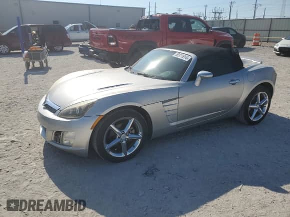 2009 Saturn Sky Red Line with VIN 1G8MT35X69Y106090, listed as a Copart auction lot 59311614 with 76,224 mi miles and Clean title. Bid and sale history available at DreamBid. Image 1.