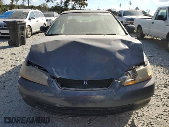 2000 Honda Accord LX z VIN 1HGCG324XYA007975, wystawiony jako Copart lot #78386544 z przebiegiem 333 075 mil mil oraz Szkoda całkowita • Salvage title. Historia ofert i sprzedaży dostępna na DreamBid. Obrazek 5.