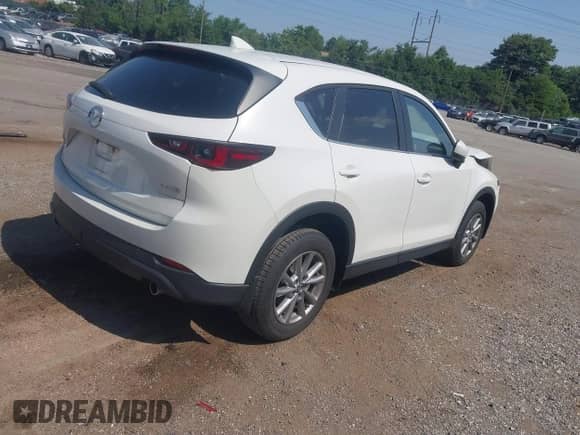 2023 Mazda CX-5 S Preferred z VIN JM3KFBCM2P0249791, wystawiony jako IAAI lot #42831354 z przebiegiem 31 858 mil mil oraz . Historia ofert i sprzedaży dostępna na DreamBid. Obrazek 4.