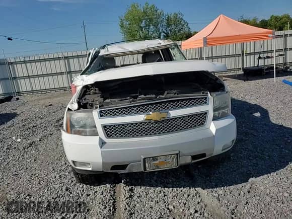2013 Chevrolet Tahoe LT с VIN 1GNSCBE06DR165872, выставлен на аукционе Copart как лот 70278435 с пробегом Не указан миль и Списание • Salvage title. История ставок и продаж доступна на DreamBid. Изображение 14.