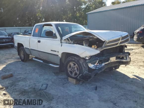 1998 Dodge 1500 with VIN 3B7HC12Y8WG217402, listed as a Copart auction lot 85560594 with 247,896 mi miles and Salvage title. Bid and sale history available at DreamBid. Image 4.
