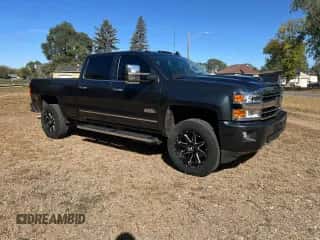 2018 Chevrolet Silverado 2500HD High Country с VIN 1GC1KXEY8JF125042, выставлен на аукционе Copart как лот 90888595 с пробегом 121 356 миль миль и Списание • Salvage title. История ставок и продаж доступна на DreamBid. Изображение 1.