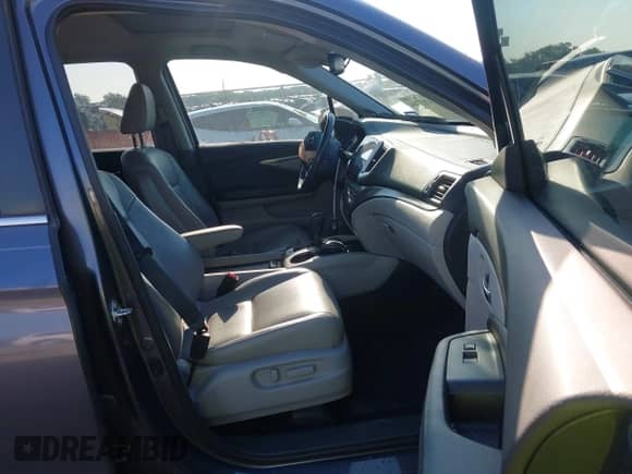 2017 Honda Pilot EX-L with VIN 5FNYF5H67HB030603, listed as a IAAI auction lot 43037104 with 94,827 mi miles and . Bid and sale history available at DreamBid. Image 5.