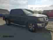 2011 Nissan Frontier SV with VIN 1N6AD0ER5BC441976, listed as a Copart auction lot 70905715 with 243,384 mi miles and Salvage title. Bid and sale history available at DreamBid. Image 4.