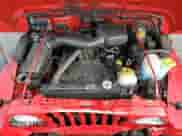 2000 Jeep Wrangler SE with VIN 1J4FA29P8YP711686, listed as a Copart auction lot 68999455 with 100,108 mi miles and Salvage title. Bid and sale history available at DreamBid. Image 12.