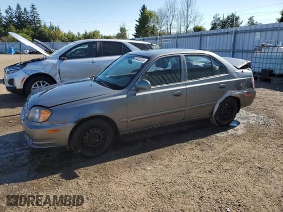 2005 Hyundai Accent GLS с VIN KMHCG45C05U605716, выставлен на аукционе Copart как лот 69445324 с пробегом 158 082 миль миль и Чистый • Clean title. История ставок и продаж доступна на DreamBid. Изображение 1.