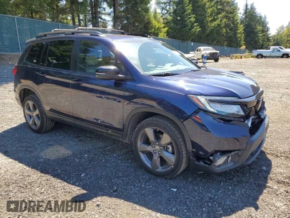 2021 Honda Passport Touring with VIN 5FNYF8H92MB042258, listed as a Copart auction lot 68150945 with 60,684 mi miles and Salvage title. Bid and sale history available at DreamBid. Image 4.