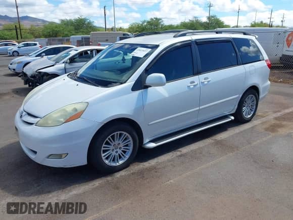 2006 Toyota Sienna XLE z VIN 5TDZA22C86S521741, wystawiony jako IAAI lot #43013437 z przebiegiem 158 907 mil mil oraz . Historia ofert i sprzedaży dostępna na DreamBid. Obrazek 2.