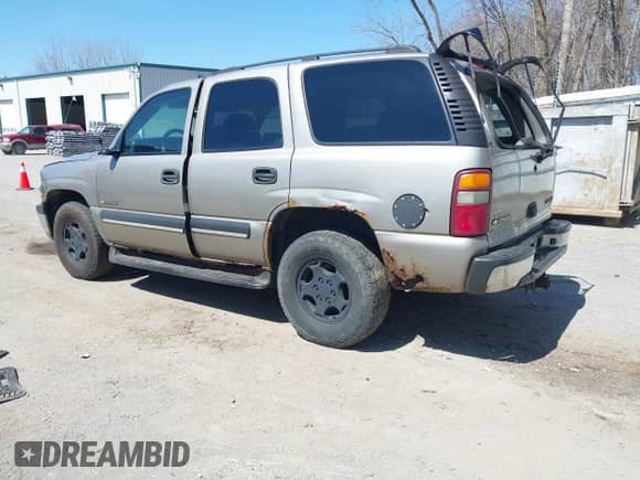 2003 Chevrolet Tahoe LT z VIN 1GNEK13Z83J107450, wystawiony jako IAAI lot #42006801 z przebiegiem 310 767 mil mil oraz . Historia ofert i sprzedaży dostępna na DreamBid. Obrazek 3.
