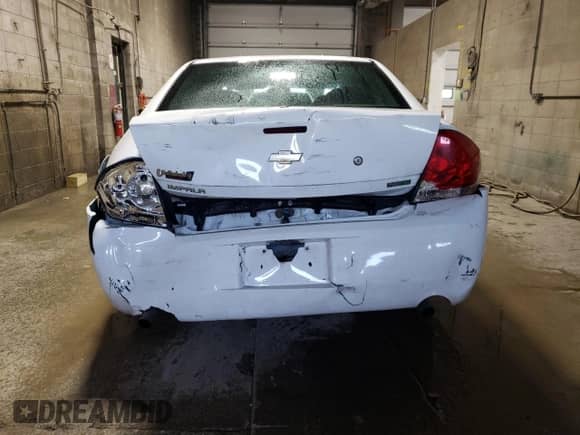 2013 Chevrolet Impala Police z VIN 2G1WD5E3XD1243509, wystawiony jako Copart lot #66715925 z przebiegiem 158 766 mil mil oraz Szkoda całkowita • Salvage title. Historia ofert i sprzedaży dostępna na DreamBid. Obrazek 6.