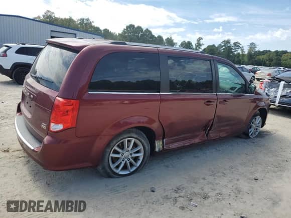 2019 Dodge Grand Caravan SXT with VIN 2C4RDGCG5KR735630, listed as a Copart auction lot 81633725 with 125,428 mi miles and Salvage title. Bid and sale history available at DreamBid. Image 3.