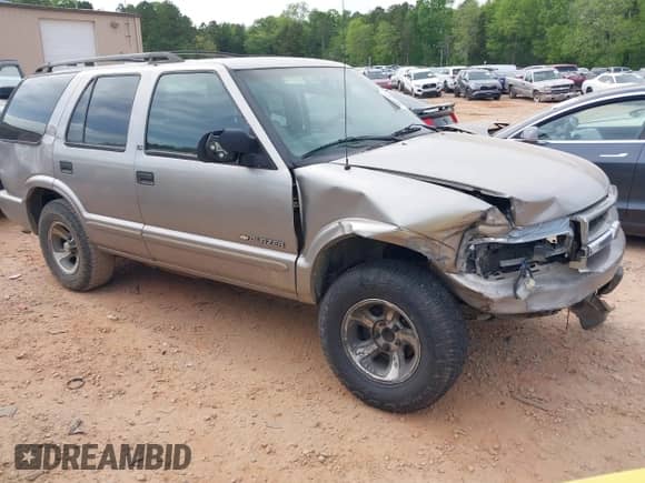 2003 Chevrolet Blazer LS с VIN 1GNCS13X43K102715, выставлен на аукционе IAAI как лот 41983401 с пробегом 164 897 миль миль и . История ставок и продаж доступна на DreamBid. Изображение 1.