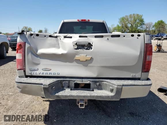2009 Chevrolet Silverado 1500 with VIN 1GCEK24099Z237813, listed as a Copart auction lot 54860645 with 107,525 mi miles and Salvage title. Bid and sale history available at DreamBid. Image 6.