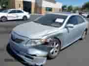 2007 Toyota Camry XLE with VIN 4T1BK46K67U012767, listed as a IAAI auction lot 43156075 with 200,969 mi miles and . Bid and sale history available at DreamBid. Image 2.