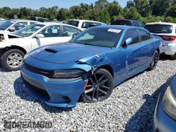 2021 Dodge Charger R/T с VIN 2C3CDXCT2MH612769, выставлен на аукционе Copart как лот 80467435 с пробегом 24 585 миль миль и На запчасти • Non repairable. История ставок и продаж доступна на DreamBid. Изображение 1.