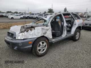 2003 Hyundai Santa Fe GLS с VIN KM8SC73D03U458797, выставлен на аукционе Copart как лот 69877294 с пробегом Не указан миль и Списание • Salvage title. История ставок и продаж доступна на DreamBid. Изображение 1.