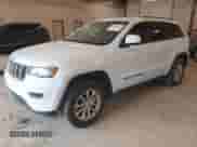 2021 Jeep Grand Cherokee Laredo E with VIN 1C4RJFAG0MC569163, listed as a IAAI auction lot 42653930 with 66,739 mi miles and . Bid and sale history available at DreamBid. Image 2.