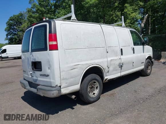 2004 Chevrolet Express Cargo with VIN 1GCGG25V341149951, listed as a IAAI auction lot 42409876 with 342,944 mi miles and . Bid and sale history available at DreamBid. Image 4.