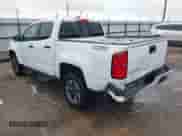 2021 Chevrolet Colorado 4WD Z71 z VIN 1GCGTDEN9M1256767, wystawiony jako IAAI lot #42188311 z przebiegiem 55 116 mil mil oraz . Historia ofert i sprzedaży dostępna na DreamBid. Obrazek 3.