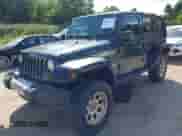 2008 Jeep Wrangler Unlimited Sahara with VIN 1J4GA59128L607591, listed as a IAAI auction lot 42959722 with 129,564 mi miles and . Bid and sale history available at DreamBid. Image 2.