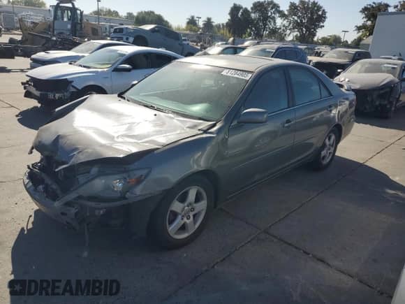 2005 Toyota Camry LE с VIN 4T1BE30K65U611529, выставлен на аукционе Copart как лот 81284905 с пробегом 309 557 миль миль и Списание • Salvage title. История ставок и продаж доступна на DreamBid. Изображение 1.