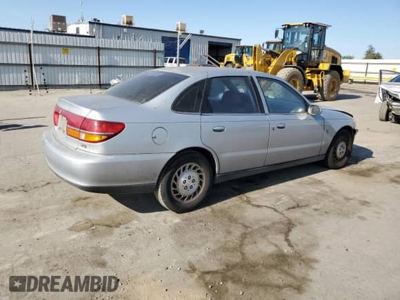 2000 Saturn LS with VIN 1G8JW52R0YY636923, listed as a Copart auction lot 62186235 with 335,017 mi miles and Salvage title. Bid and sale history available at DreamBid. Image 3.