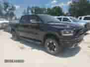 2023 Ram 1500 Rebel with VIN 1C6SRFLT4PN554816, listed as a Copart auction lot 66319915 with 96,984 mi miles and Salvage title. Bid and sale history available at DreamBid. Image 4.