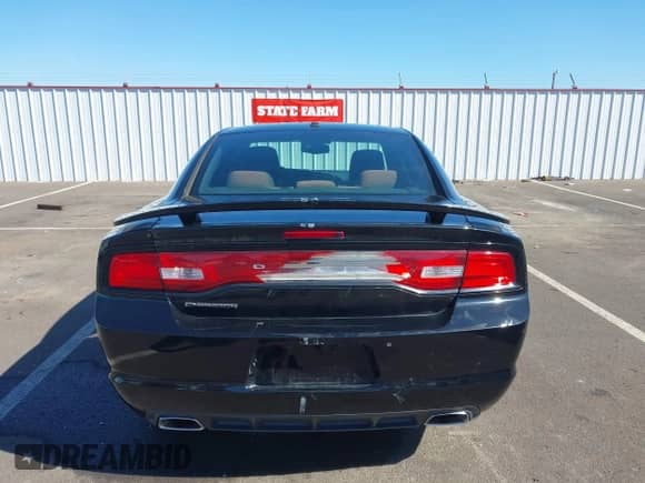 2012 Dodge Charger SXT с VIN 2C3CDXHG9CH302919, выставлен на аукционе IAAI как лот 42975118 с пробегом 187 711 миль миль и . История ставок и продаж доступна на DreamBid. Изображение 16.