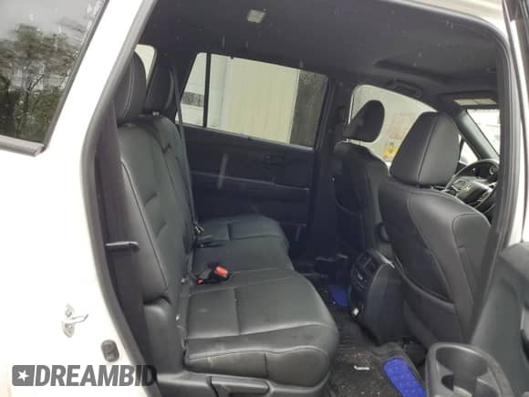 2023 Honda Passport Elite with VIN 5FNYF8H0XPB017677, listed as a Copart auction lot 57938675 with 22,185 mi miles and Salvage title. Bid and sale history available at DreamBid. Image 11.
