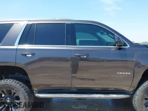 2016 Chevrolet Tahoe LS z VIN 1GNSKAKC4GR163733, wystawiony jako IAAI lot #42242113 z przebiegiem 72 619 mil mil oraz . Historia ofert i sprzedaży dostępna na DreamBid. Obrazek 14.