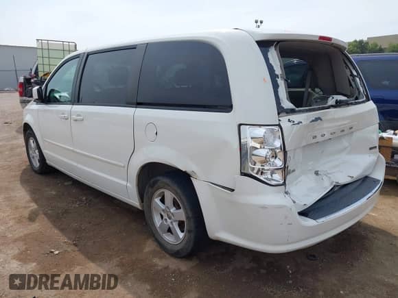 2012 Dodge Grand Caravan SXT with VIN 2C4RDGCG9CR275700, listed as a IAAI auction lot 43158372 with 168,109 mi miles and . Bid and sale history available at DreamBid. Image 3.