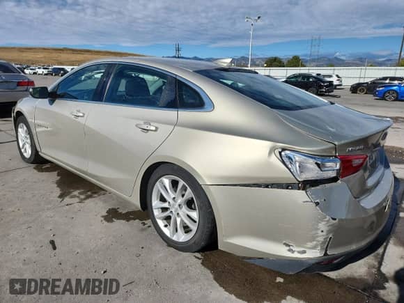 2016 Chevrolet Malibu LT z VIN 1G1ZE5STXGF301579, wystawiony jako Copart lot #84935235 z przebiegiem 94 018 mil mil oraz Szkoda całkowita • Salvage title. Historia ofert i sprzedaży dostępna na DreamBid. Obrazek 2.