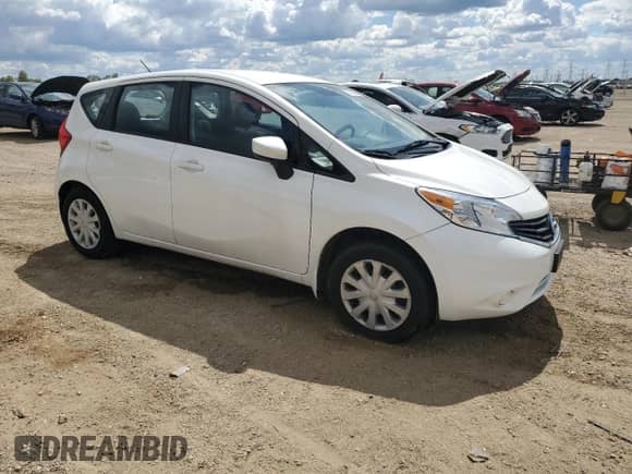 2015 Nissan Note S Plus with VIN 3N1CE2CP3FL378086, listed as a Copart auction lot 70332505 with 104,376 mi miles and Salvage title. Bid and sale history available at DreamBid. Image 4.