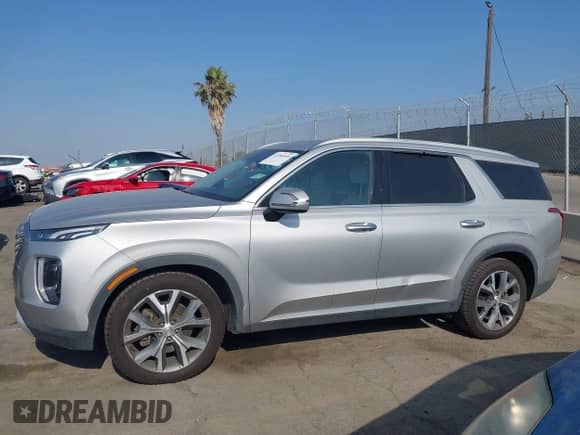 2021 Hyundai Palisade SEL with VIN KM8R44HEXMU305261, listed as a IAAI auction lot 42956509 with 79,930 mi miles and . Bid and sale history available at DreamBid. Image 14.