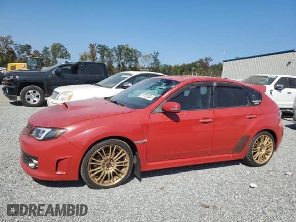 2009 Subaru WRX STI with VIN JF1GR89699L826521, listed as a Copart auction lot 74781604 with 198,228 mi miles and Salvage title. Bid and sale history available at DreamBid. Image 1.
