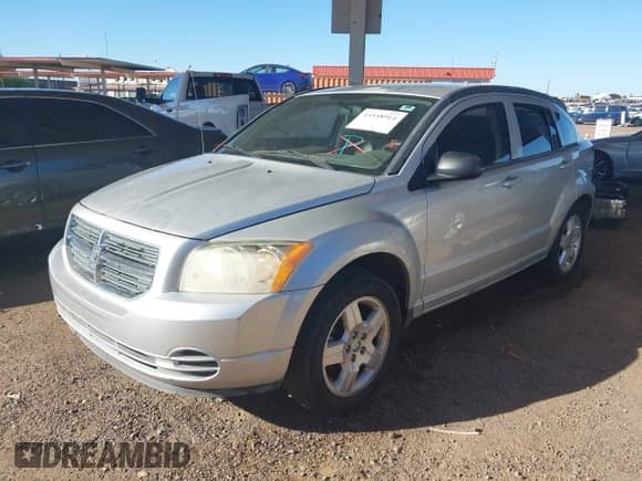 2009 Dodge Caliber SXT with VIN 1B3HB48CX9D148649, listed as a IAAI auction lot 43348914 with 178,089 mi miles and . Bid and sale history available at DreamBid. Image 2.