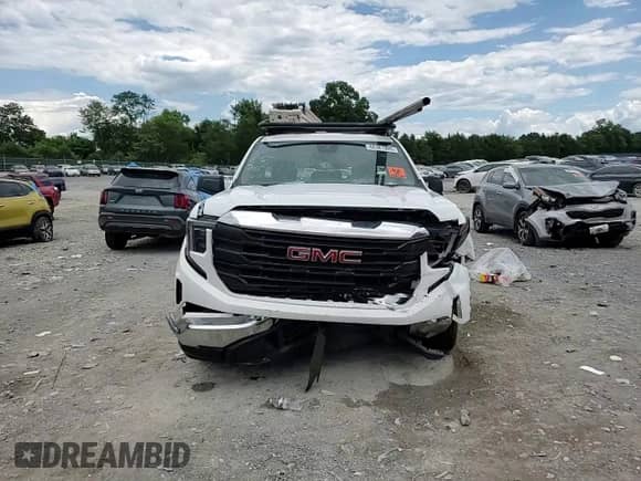 2023 GMC Sierra 1500 Pro with VIN 3GTNHAEK7PG170683, listed as a Copart auction lot 66381905 with 66,767 mi miles and Salvage title. Bid and sale history available at DreamBid. Image 13.