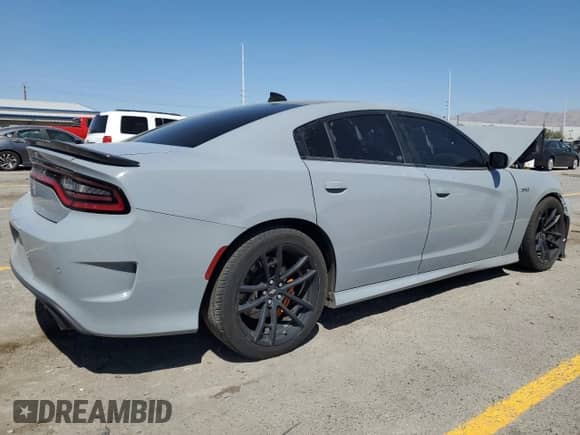 2020 Dodge Charger Scat Pack z VIN 2C3CDXGJXLH221103, wystawiony jako Copart lot #68514025 z przebiegiem 114 551 mil mil oraz Szkoda całkowita • Salvage title. Historia ofert i sprzedaży dostępna na DreamBid. Obrazek 3.