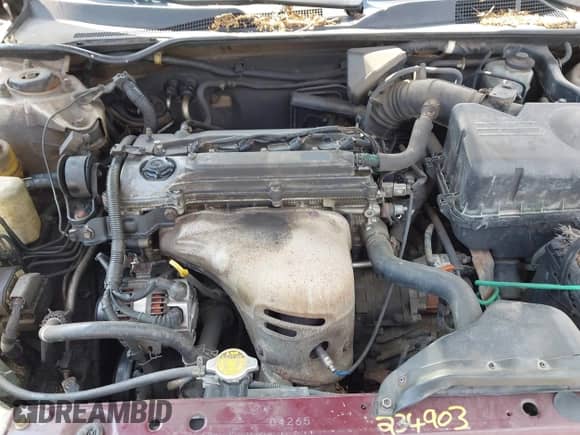 2002 Toyota Camry LE z VIN 4T1BE30K42U639339, wystawiony jako IAAI lot #42914465 z przebiegiem 384 427 mil mil oraz . Historia ofert i sprzedaży dostępna na DreamBid. Obrazek 10.