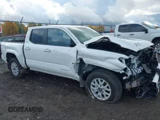 2024 Toyota Tacoma SR5 with VIN 3TMLB5JN5RM010502, listed as a IAAI auction lot 43521054 with 22,894 mi miles and . Bid and sale history available at DreamBid. Image 1.