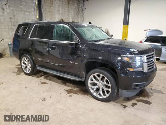 2018 Chevrolet Tahoe LS z VIN 1GNSKAKC2JR365106, wystawiony jako Copart lot #85100975 z przebiegiem 159 347 mil mil oraz Szkoda całkowita • Salvage title. Historia ofert i sprzedaży dostępna na DreamBid. Obrazek 4.