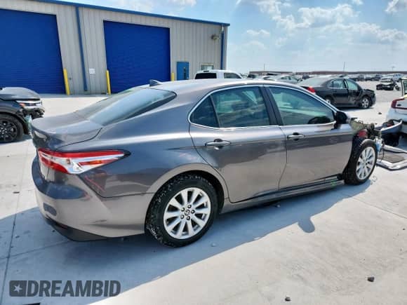 2019 Toyota Camry LE с VIN 4T1B11HK7KU815143, выставлен на аукционе Copart как лот 69475835 с пробегом 122 992 миль миль и Списание • Salvage title. История ставок и продаж доступна на DreamBid. Изображение 3.
