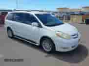 2006 Toyota Sienna XLE z VIN 5TDZA22C86S521741, wystawiony jako IAAI lot #43013437 z przebiegiem 158 907 mil mil oraz . Historia ofert i sprzedaży dostępna na DreamBid. Obrazek 1.