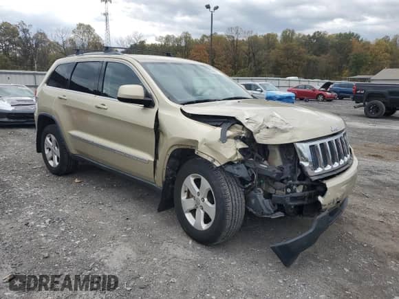 2012 Jeep Grand Cherokee Laredo z VIN 1C4RJFAG0CC156397, wystawiony jako Copart lot #87400775 z przebiegiem 165 192 mil mil oraz Szkoda całkowita • Salvage title. Historia ofert i sprzedaży dostępna na DreamBid. Obrazek 4.