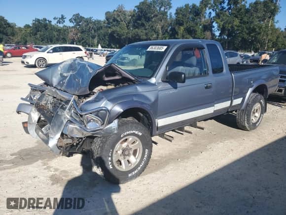 1997 Toyota Tacoma z VIN 4TAWM72N4VZ256544, wystawiony jako Copart lot #86303685 z przebiegiem 245 875 mil mil oraz Szkoda całkowita • Salvage title. Historia ofert i sprzedaży dostępna na DreamBid. Obrazek 1.